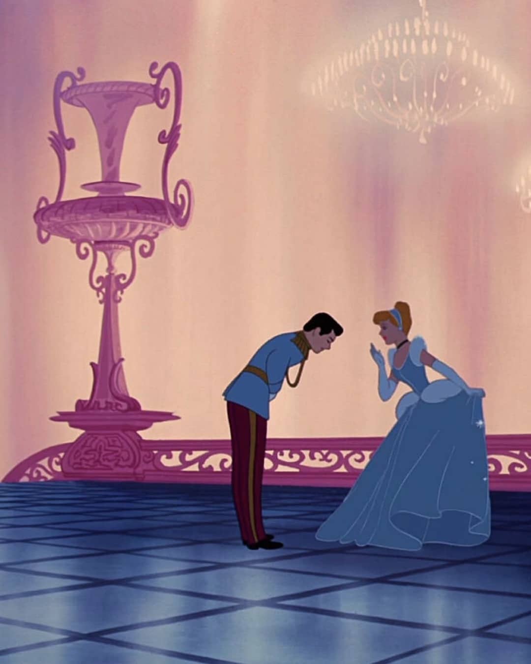 Animated scene of Cinderella and Prince Charming bowing to each other in a grand ballroom, with elegant pink walls and chandeliers—a magical moment straight out of childhood flicks, perfect for some timeless love advice.