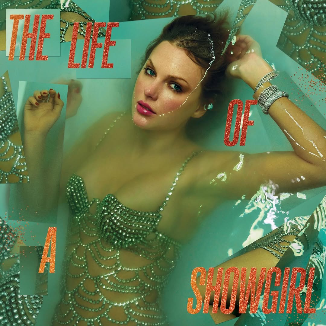 A woman in a beaded, jeweled outfit poses in a bathtub filled with water. Overlaid orange text reads, THE LIFE OF A SHOWGIRL!.